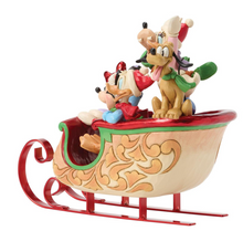 Load image into Gallery viewer, Decorative figurine of two animated characters in a sleigh on a white background

