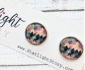 Multicolored patterned earrings on a Starlight Story branded card.