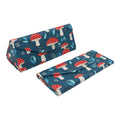 Two blue fabric cases with red and white mushroom pattern on a white background