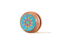 Load image into Gallery viewer, Wooden yoyo with a colorful circular design on a white background
