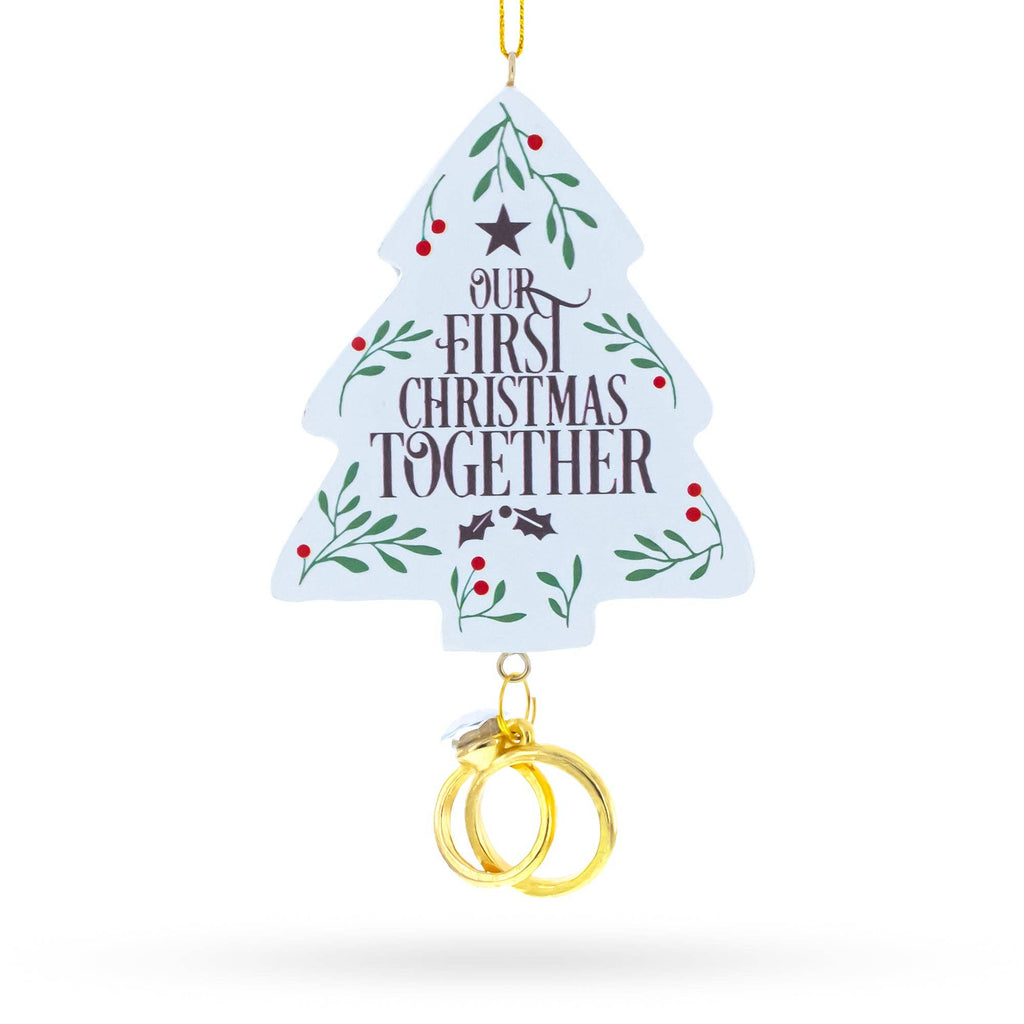 Decorative Christmas tree ornament with 'Our First Christmas Together' text and gold rings on a white background

Details