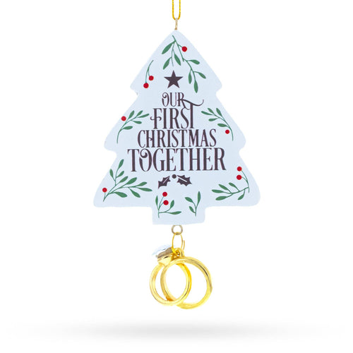 Decorative Christmas tree ornament with 'Our First Christmas Together' text and gold rings on a white background

Details