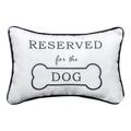Decorative pillow with 'Reserved for the Dog' text on a white background