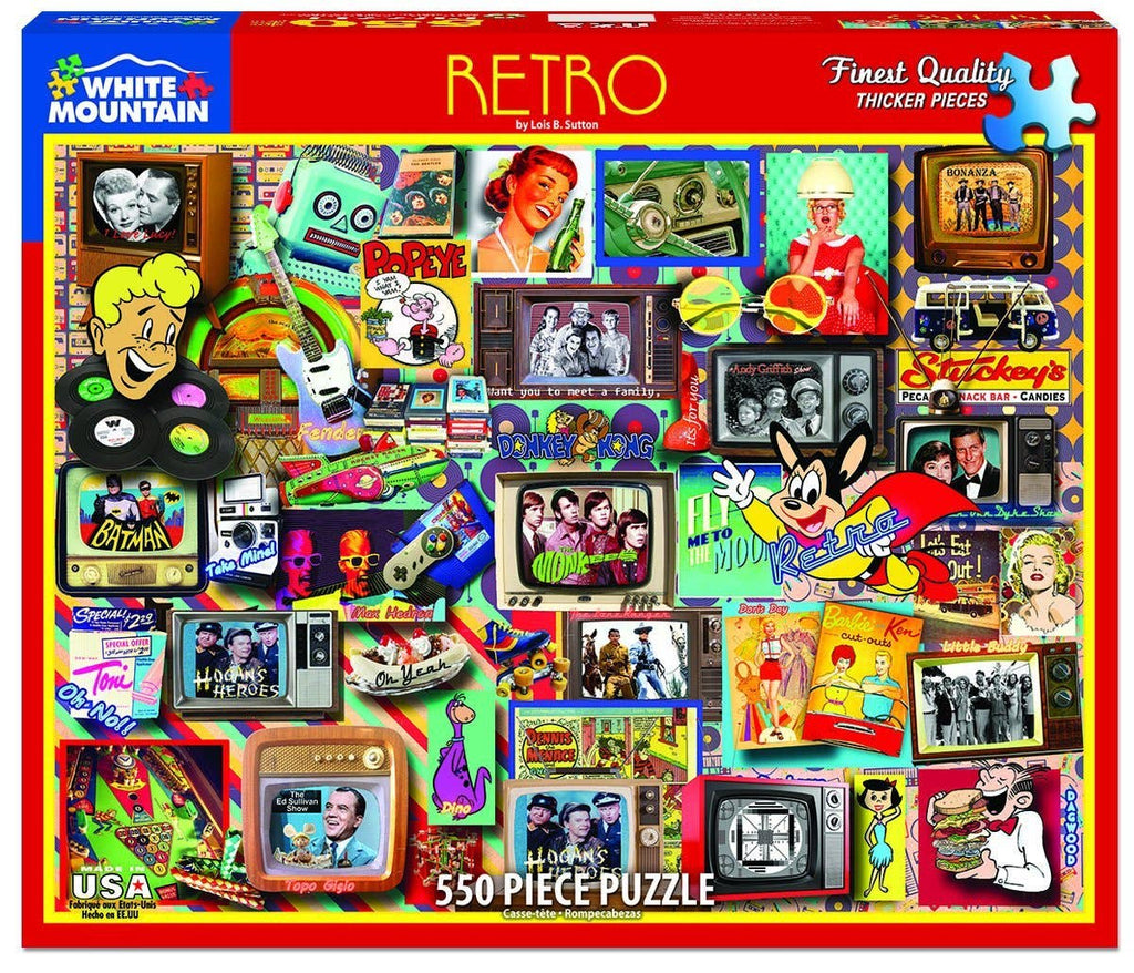 Retro-themed puzzle packaging with colorful graphics and 'White Mountain Puzzles' branding.