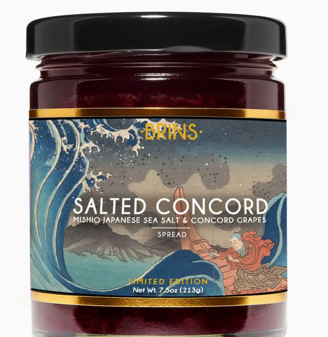 Jar of salted Concord grape spread with artistic label