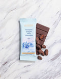 Scorpion pepper dark chocolate bar with packaging on a marble surface