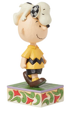 Load image into Gallery viewer, Figurine of a cartoon character with a checkered hat on a decorative base
