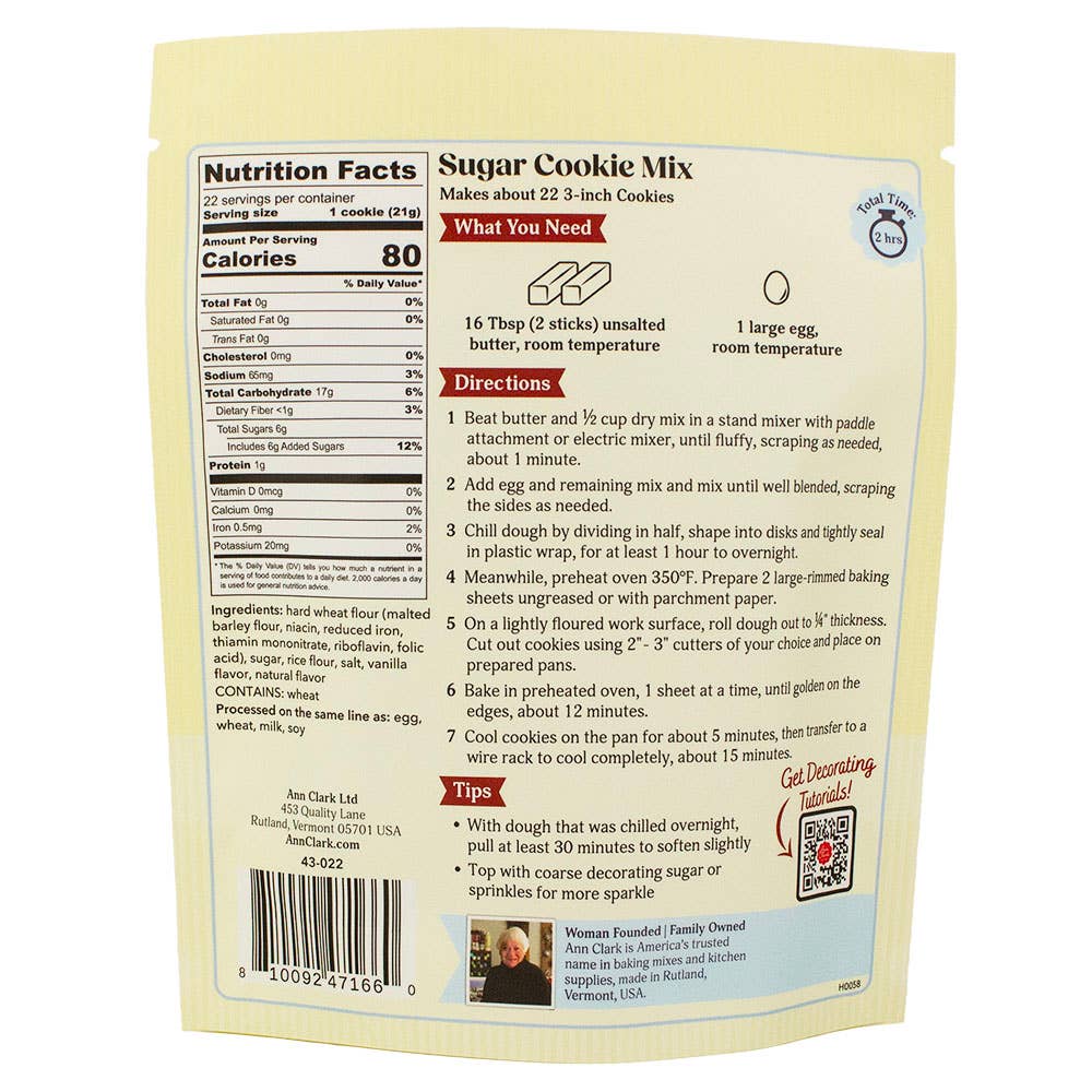 Back of a sugar cookie mix bag showing nutrition facts, directions, tips, and a small logo on a light beige background.