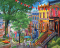 A colorful illustrated street scene with multi-story townhouses, trees, bunting, flags, stairs, and small people gathered outdoors. The artwork appears to be the product itself rather than a photo of a physical object in a room, so this fits Scenery.