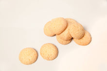 Load image into Gallery viewer, Stack of plain cookies on a light beige background

