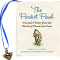 Book titled 'The Pocket Pooh' with a blue ribbon and bee charm on a white background