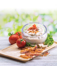 Load image into Gallery viewer, Dip with tomatoes and bacon on a wooden board outdoors
