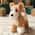 Plush dog toy on a carpeted floor with gift boxes in the background