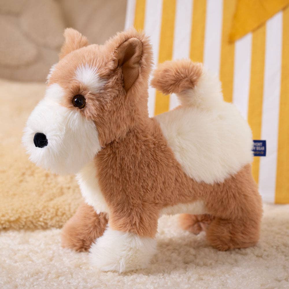 Plush dog toy on a carpeted floor with a striped wall in the background