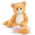 Plush toy cat with orange and white fur on a white background