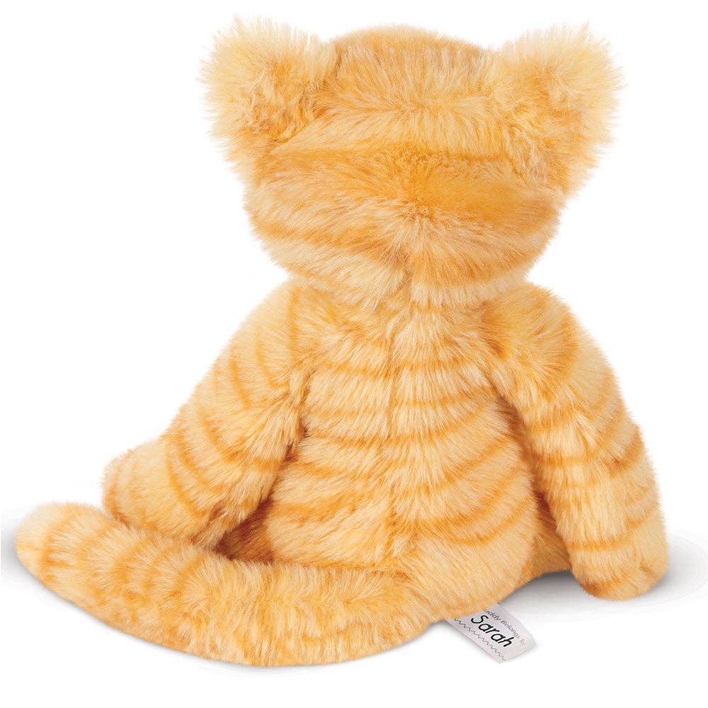 Plush tiger toy with a visible brand tag on a white background