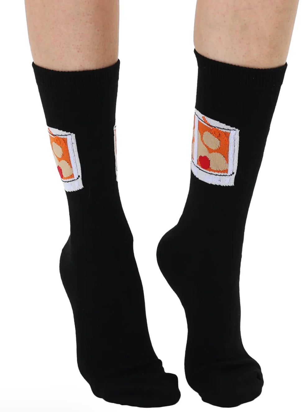 Black socks with cartoonish label design on a white background