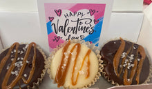 Load image into Gallery viewer, Three fudge bonbons treats with caramel drizzle in front of a 'Happy Valentine's Day' card.
